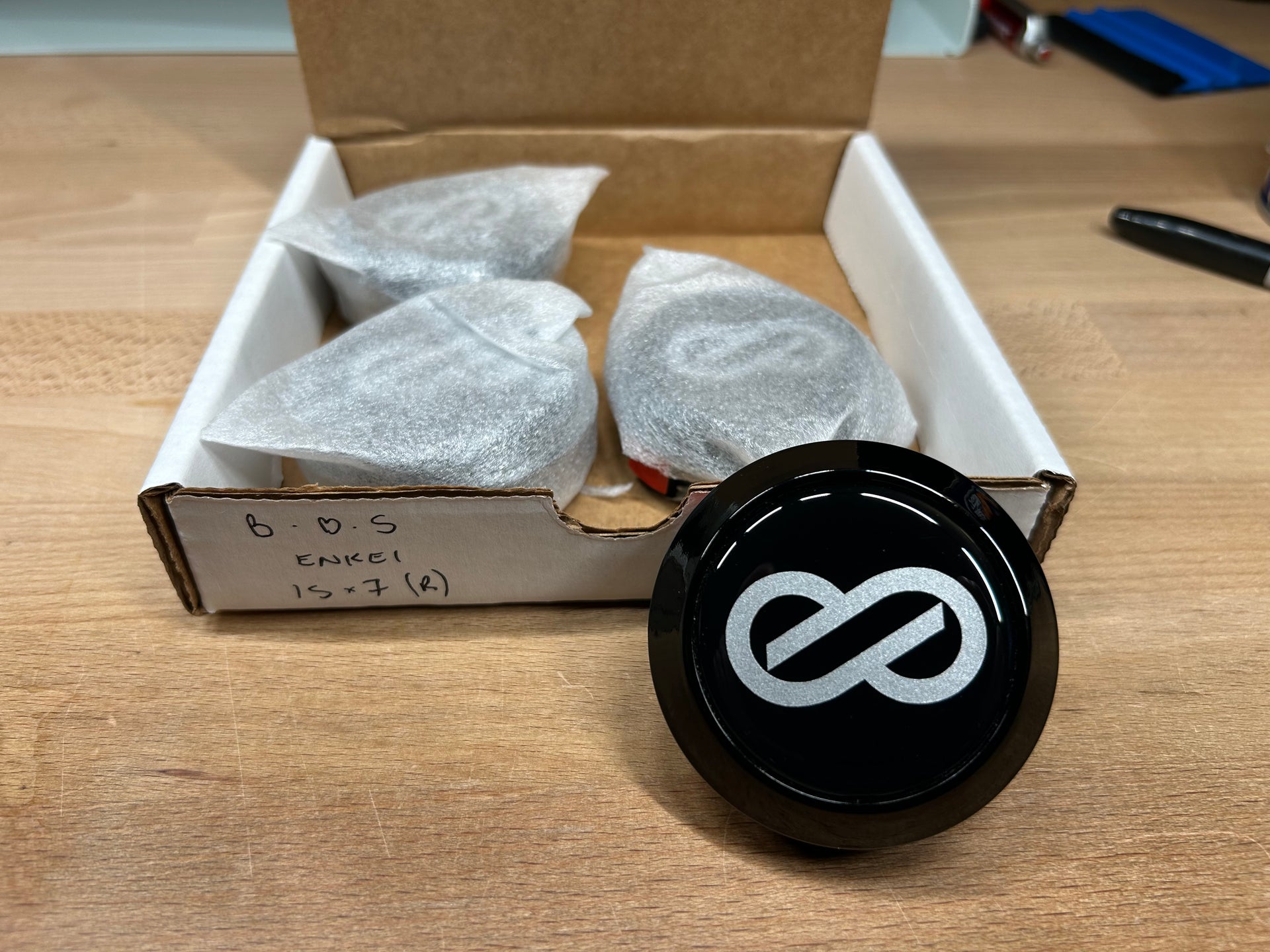 Clearance Enkei center cap, black with silver logo, 15x7